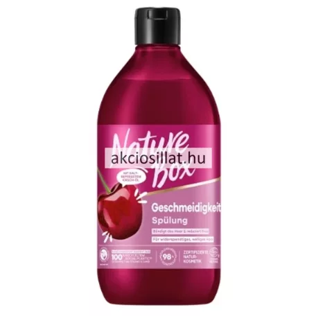 Nature Box cseresznye olaj 385ml-es hajbalzsam mélyvörös színű flakonban pink árnyalatú címkével rajta egy nagyméretű érett cseresznye grafikájával és fekete pattintós kupakkal