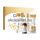 Sadoer Collagen Firming Six Piece Set 6 darabos arcápoló szett arany-fehér díszdobozban, előtte a felsorakozott lemosó tubus, arctonik, arcápoló tej, arcszérum, szemkörnyékápoló és tégelyes arckrém.