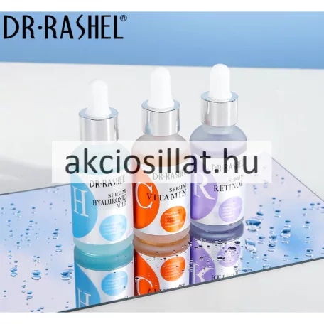 DR Rashel Complete Facial Serum Set háromrészes arcszérum csomag fehér díszdobozban, mellette a pipettás Vitamin C, Retinol és Hyaluronic Acid szérumos üvegekkel.