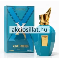 Iscents X Velvet Embrace 100ml-es parfüm elegáns sokszögletű türkizkék színű üvegflakonban melynek előlapján egy arany színű téglalap alakú plaketten dombornyomott X betű és ISCENTS felirat látható tetején pedig egy egyedi aszimmetrikus láng formájú fényes arany kupak helyezkedik el mellette a hozzá tartozó türkizkék díszdobozzal melyet egy nagyméretű sötétkék X betű motívum dekorál