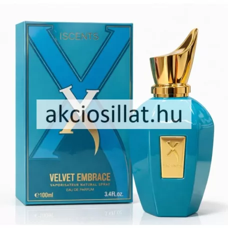 Iscents X Velvet Embrace 100ml-es parfüm elegáns sokszögletű türkizkék színű üvegflakonban melynek előlapján egy arany színű téglalap alakú plaketten dombornyomott X betű és ISCENTS felirat látható tetején pedig egy egyedi aszimmetrikus láng formájú fényes arany kupak helyezkedik el mellette a hozzá tartozó türkizkék díszdobozzal melyet egy nagyméretű sötétkék X betű motívum dekorál