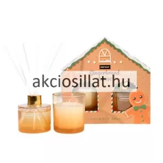 Sence Gingerbread House lakásillatosító ajándékcsomag mézeskalács házikó alakú doboza, mellette az üvegedényes illatgyertya és az arany kupakos pálcikás diffúzor.